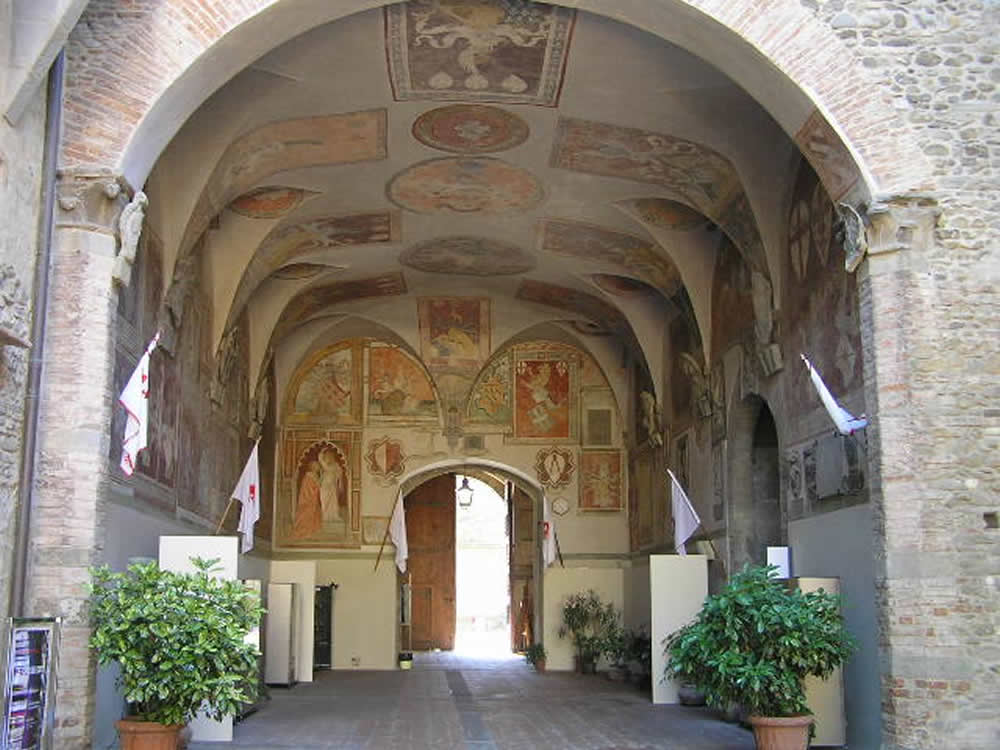 The frescoed ceiling of the entrance courtyard of the Palazzo dei Vicari, Scarperia. Author and Copyright Marco Ramerini