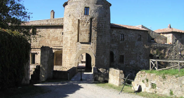 The round tower in which traces of the disappeared drawbridge are still visible. Rocca degli Orsini, Sorano, Grosseto. Author and Copyright Marco Ramerini